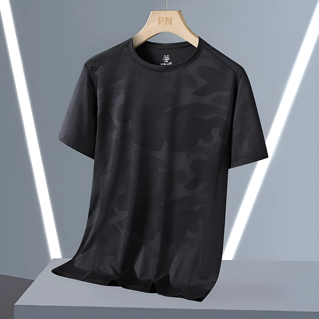 Men's camouflage pattern nylon summer t-shirt with round neck and short sleeves in loose fit.