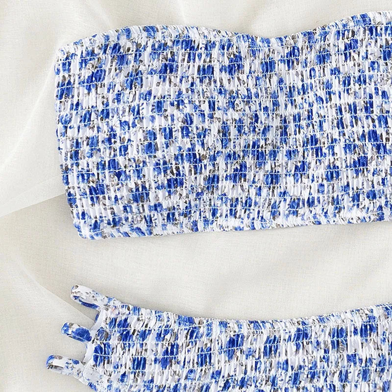 Women's strapless floral bikini set with high-waisted briefs on a white background