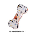 Printed bone-shaped dog chew toy in seasonal colours with TPR material