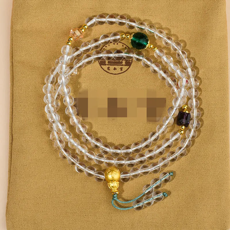 White crystal geometric bead 108 rosary bracelet laid flat, showcasing its unisex ethnic style design.