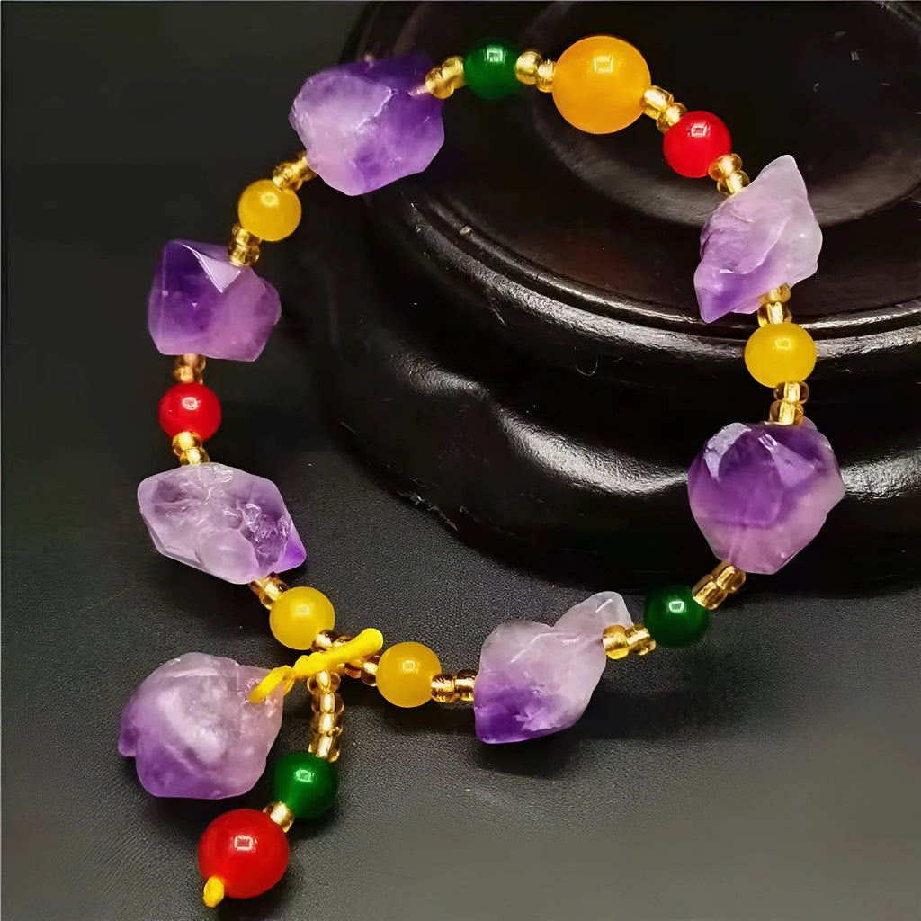 Natural style amethyst bead bracelet for women with a fu character charm.