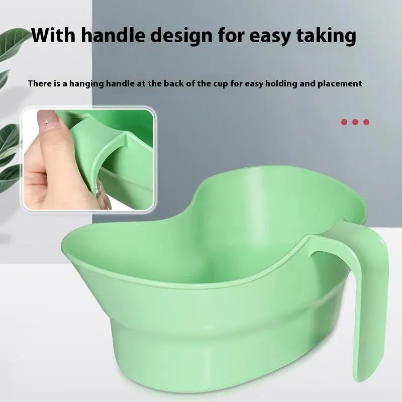 Green plastic bedridden care mug with flexible angled drinking tube