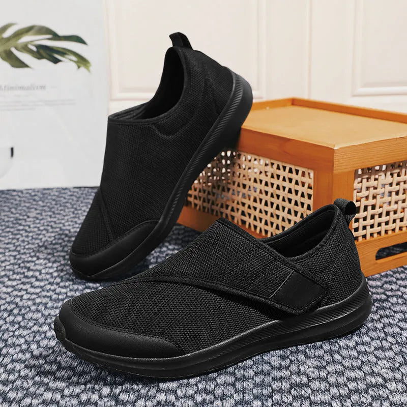 Round-toe mountaineering walking shoes with mesh upper and Velcro strap in multiple colours.
