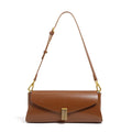 Women's cowhide leather cross-body bag in pillow shape with clamshell opening