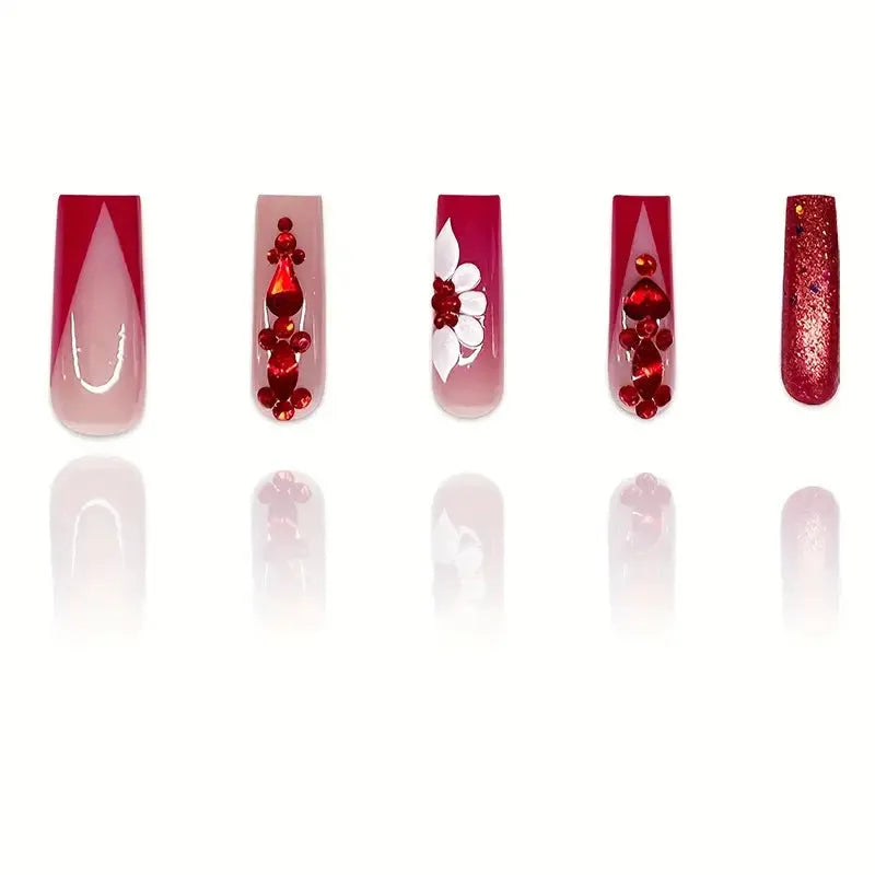Sweet Flowers Temperament patterned press-on false nails with red diamond accents in a long square shape.