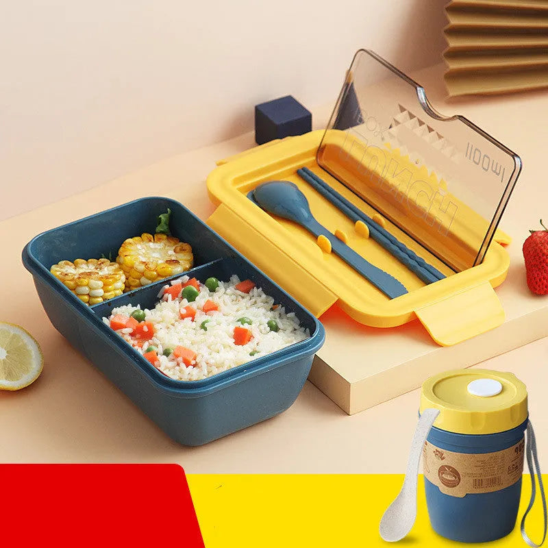 Green Japanese bento box with four separate food compartments and Nordic-style design