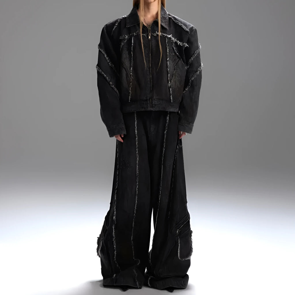 Distressed black denim coat with padded shoulders, gradient splash-dye pattern and matching trousers laid flat