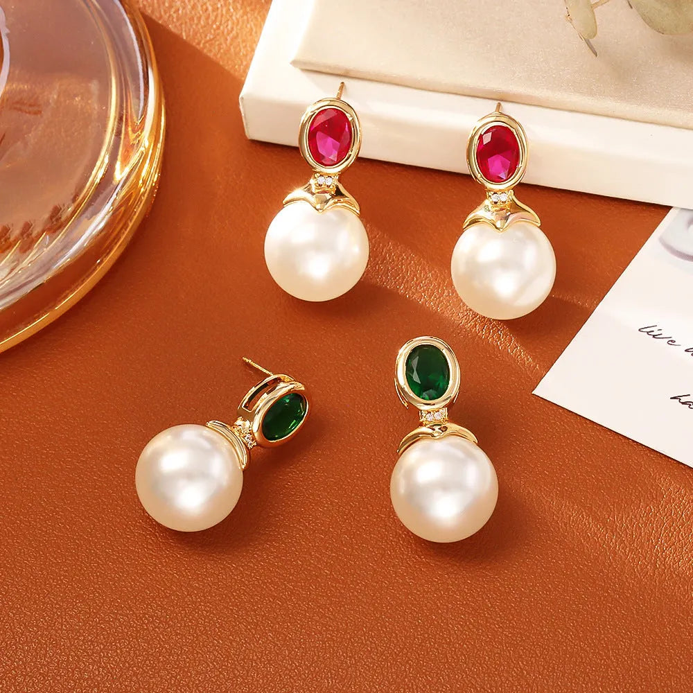 High-grade ruby pearl stud earrings with real gold plating in red colour on copper base