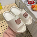 Bear slippers with non-slip EVA sole, flat bottom style, in beige colour, side view