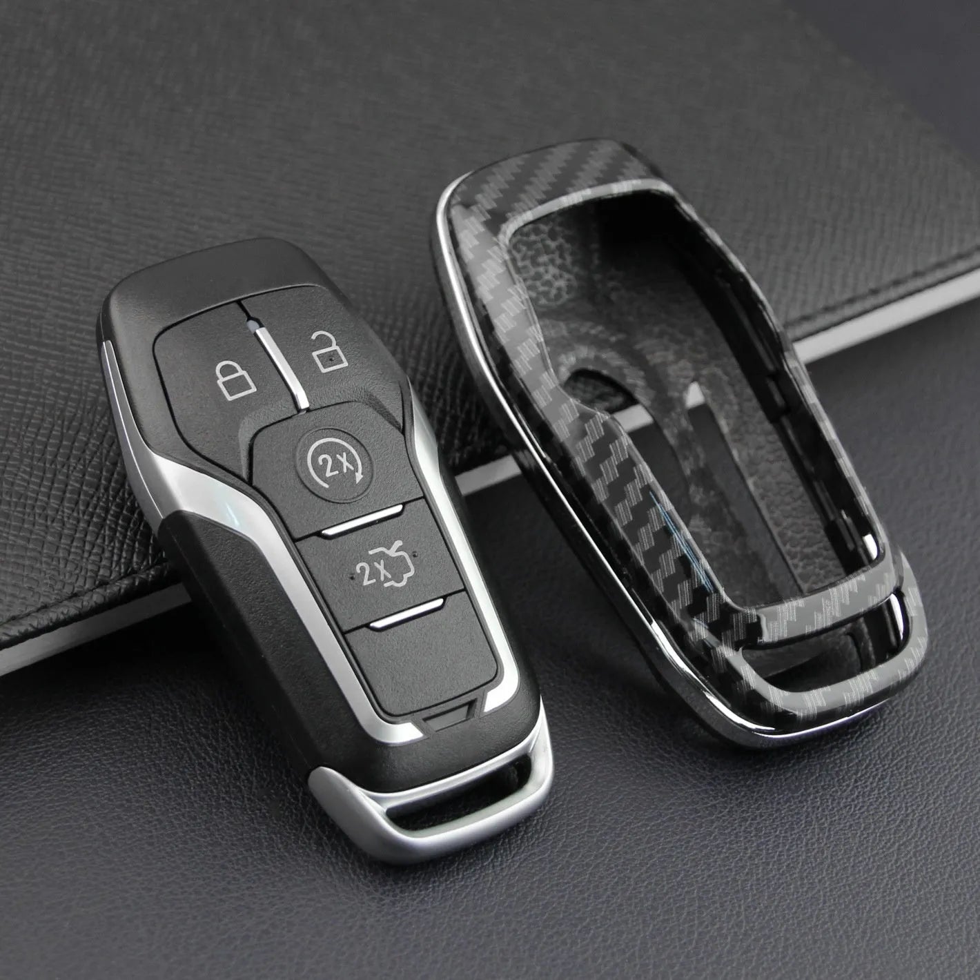 Black plastic protective shell for a car key fob with a buckle clip attachment.