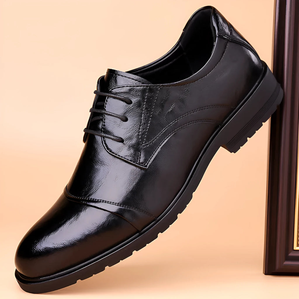 Men's business formal leather shoes with cow split leather upper, pointed toe, black colour, low shoe height on a white background