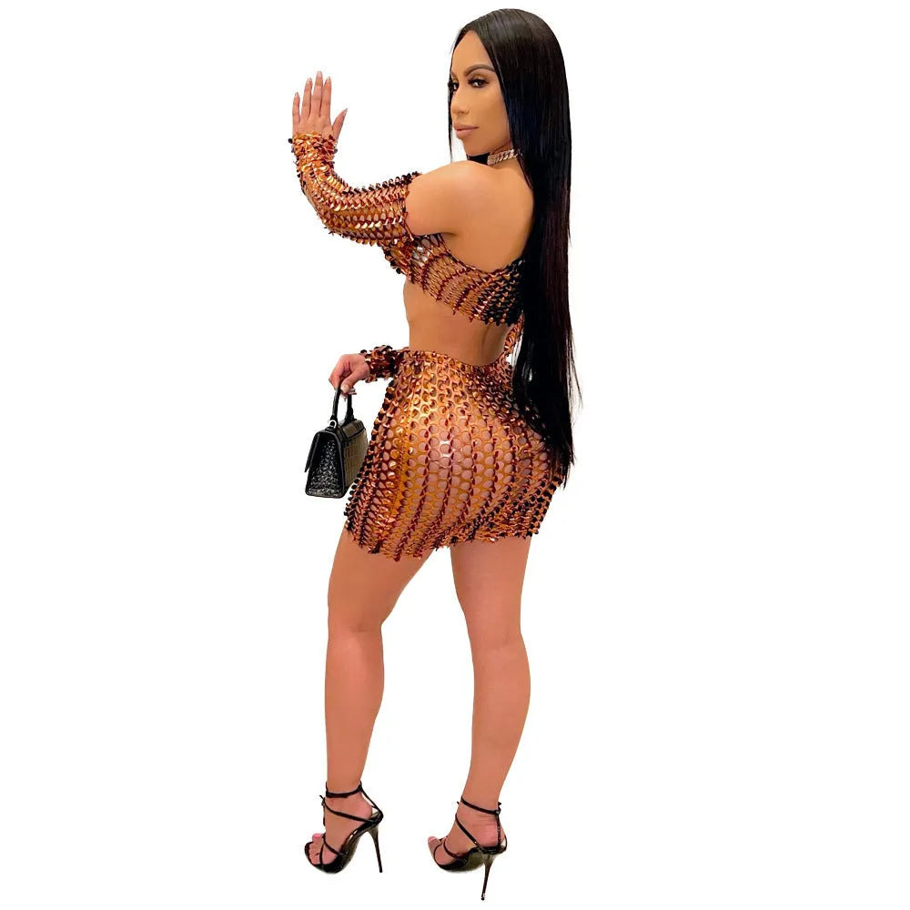 Women's black hollow-out two-piece dress set with net hole pattern showing sleeveless top and short skirt