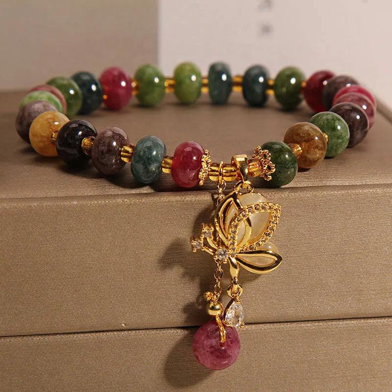 Colourful women's butterfly bracelet with tourmaline beads on alloy construction