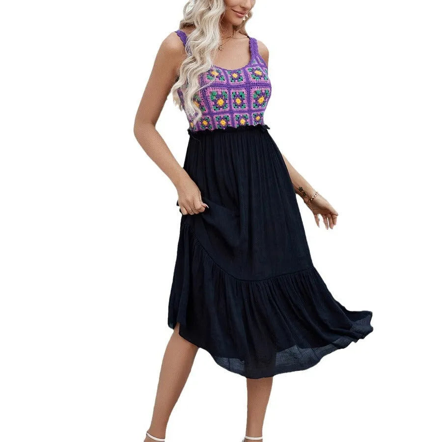 Purple sleeveless dress with hand-hooked floral embroidery on the front.