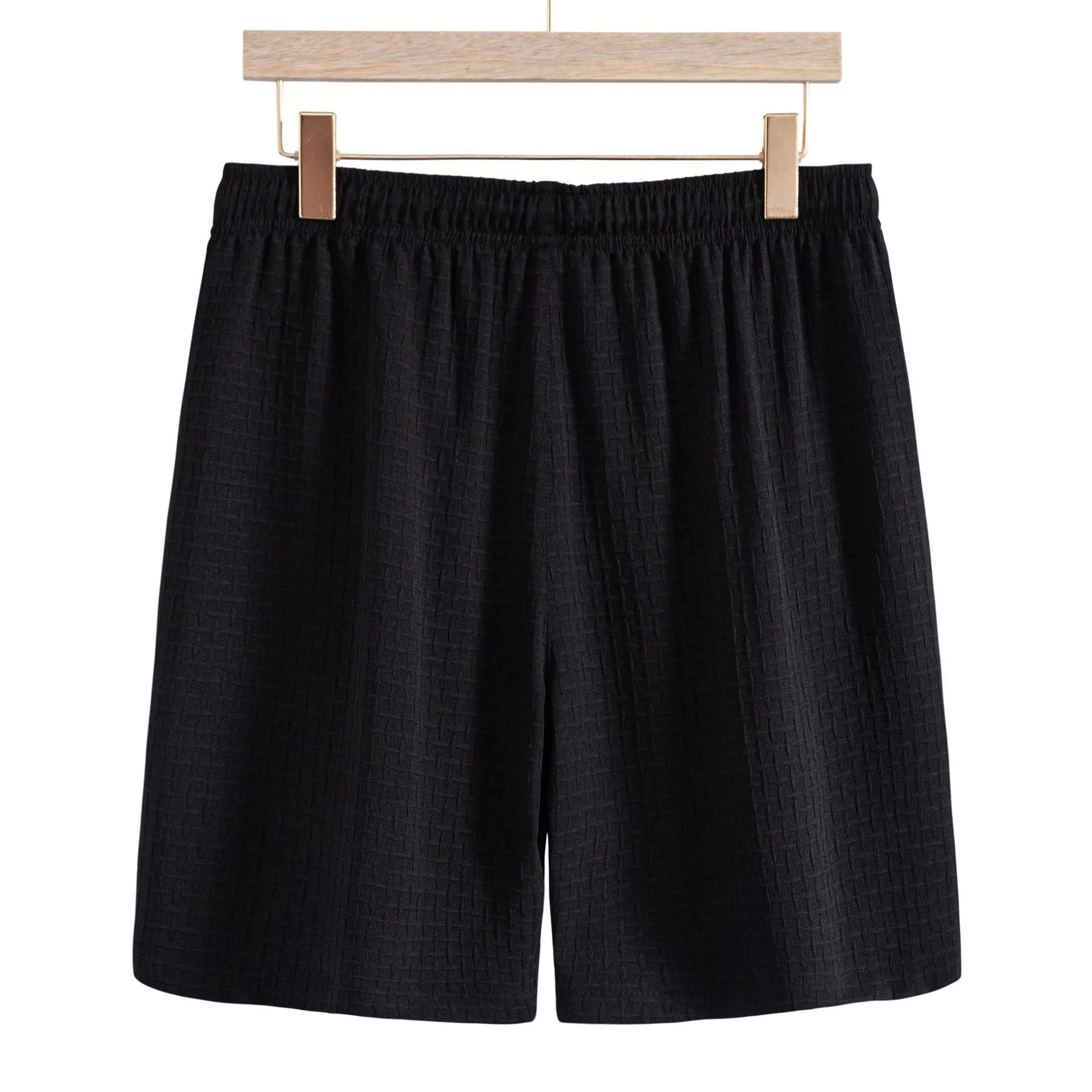 Men's white cotton blend short-sleeve shirt and shorts casual beach suit set laid flat.