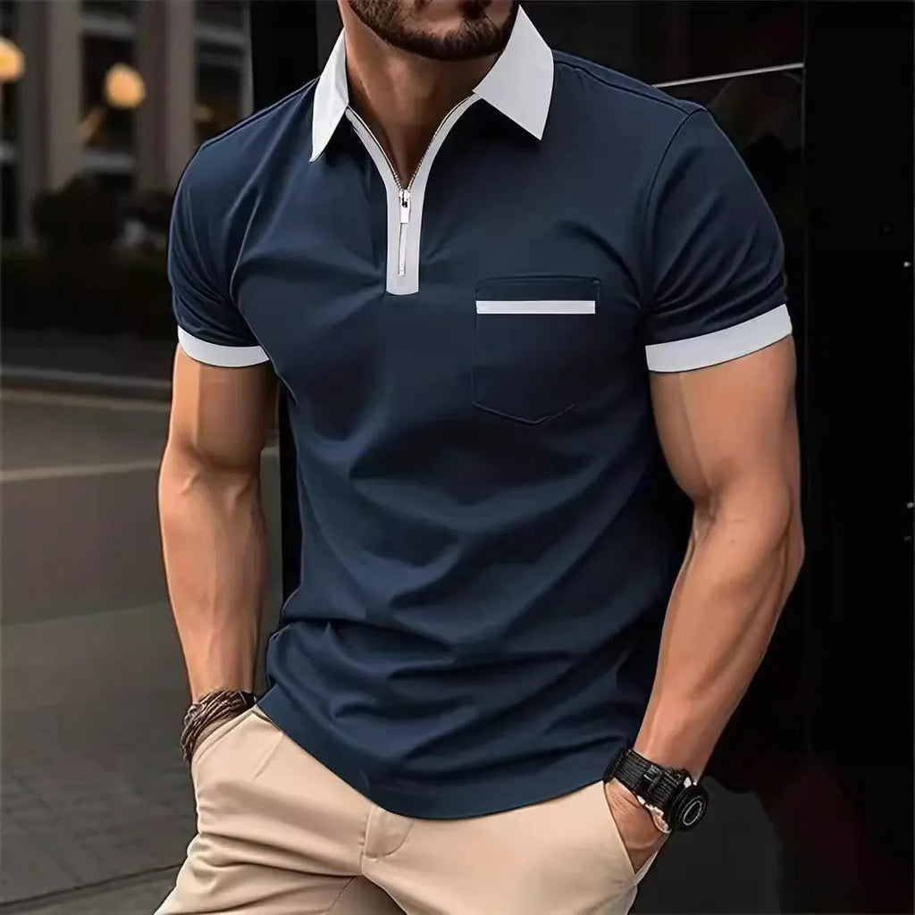 Man wearing a loose-fit casual short sleeve shirt with a chest pocket and contrast collar.