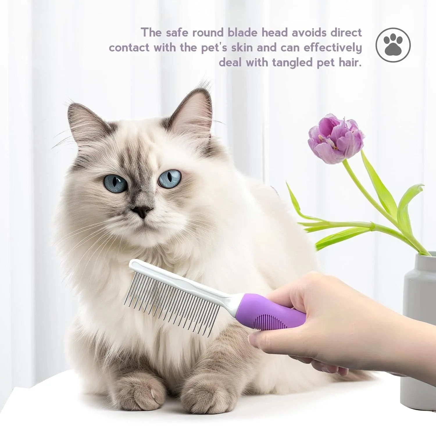 Purple pet detangling comb with stainless steel teeth and ergonomic handle for dogs and cats.