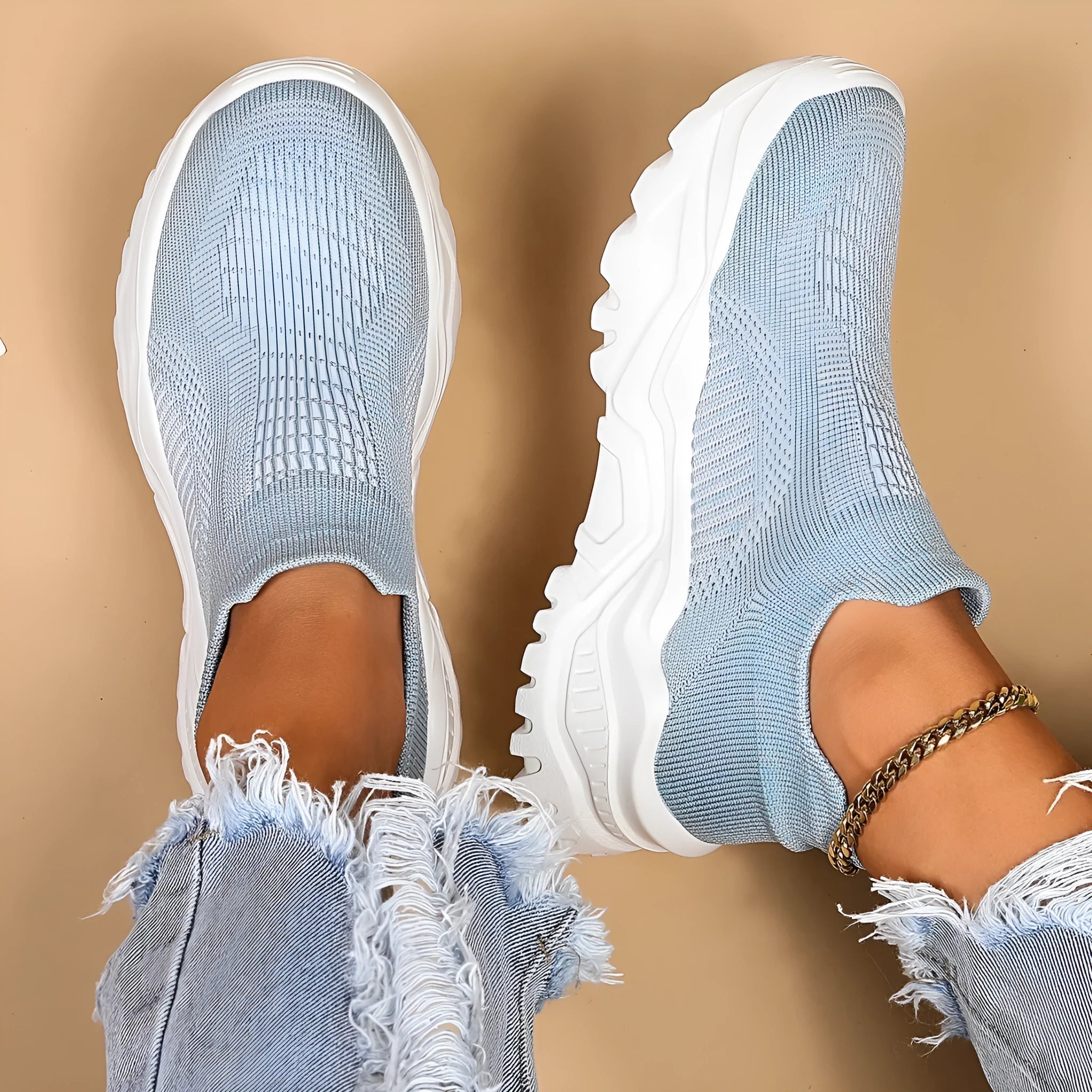 Light blue women's mesh slip-on sports shoes with woven upper and mid heel design