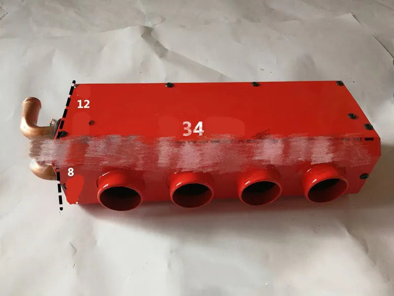 Metal car heater unit with copper pipe connections for 12V 24V auxiliary vehicle heating.