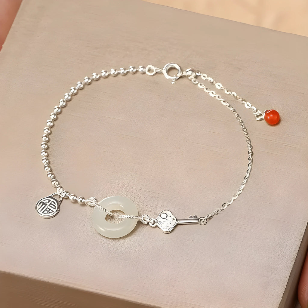 Hetian jade and 925 silver women's bracelet with geometric Chinese design and blessing card motif