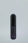 Portable negative ion hair comb for straight hair in white, blue, or grey.