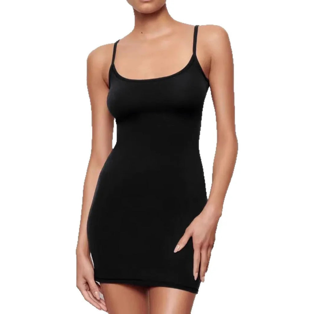 Black sleeveless sling dress with a slim sheath fit and short skirt.