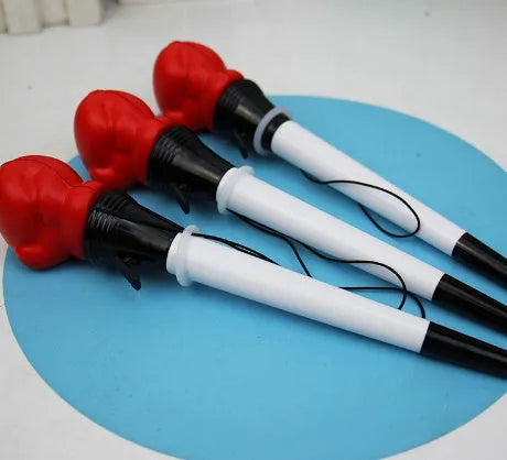 Four black pressure relief ejection pens with a plug-in sleeve fidget mechanism and 0.7mm bullet tips.