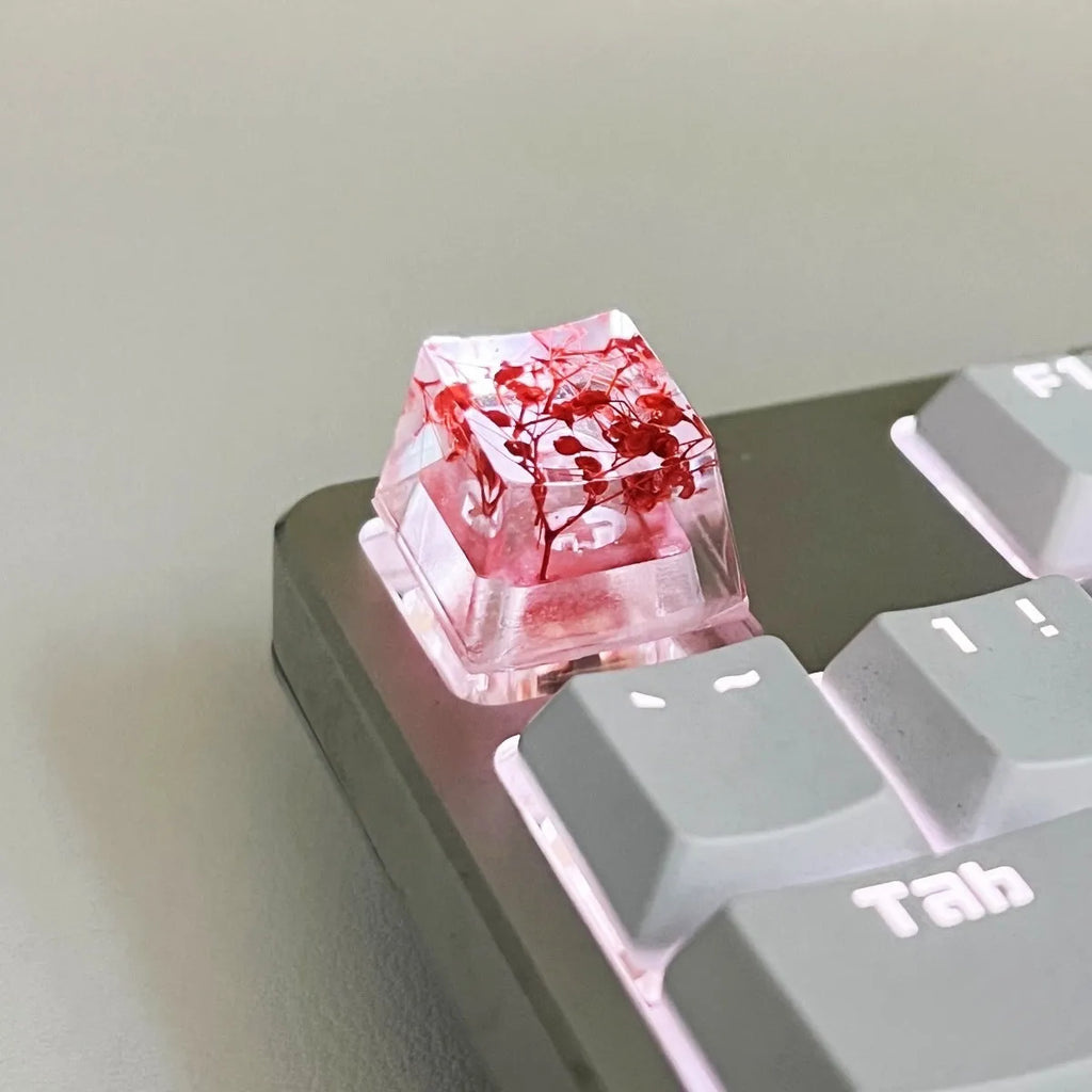 High-transparency starry sky design resin artisan keycap for mechanical keyboards, shown in green colour.