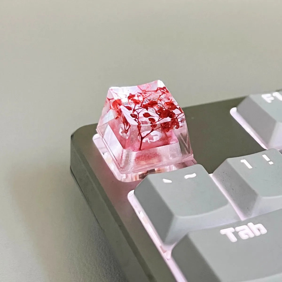 High-transparency starry sky design resin artisan keycap for mechanical keyboards, shown in green colour.