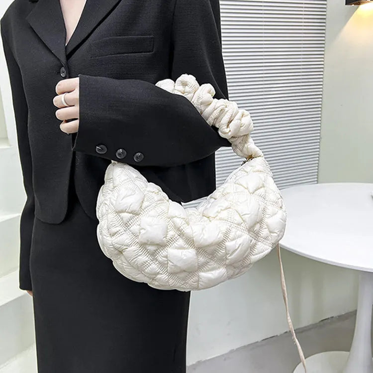 Women's nylon underarm shoulder bag in beige colour showing front view with adjustable strap