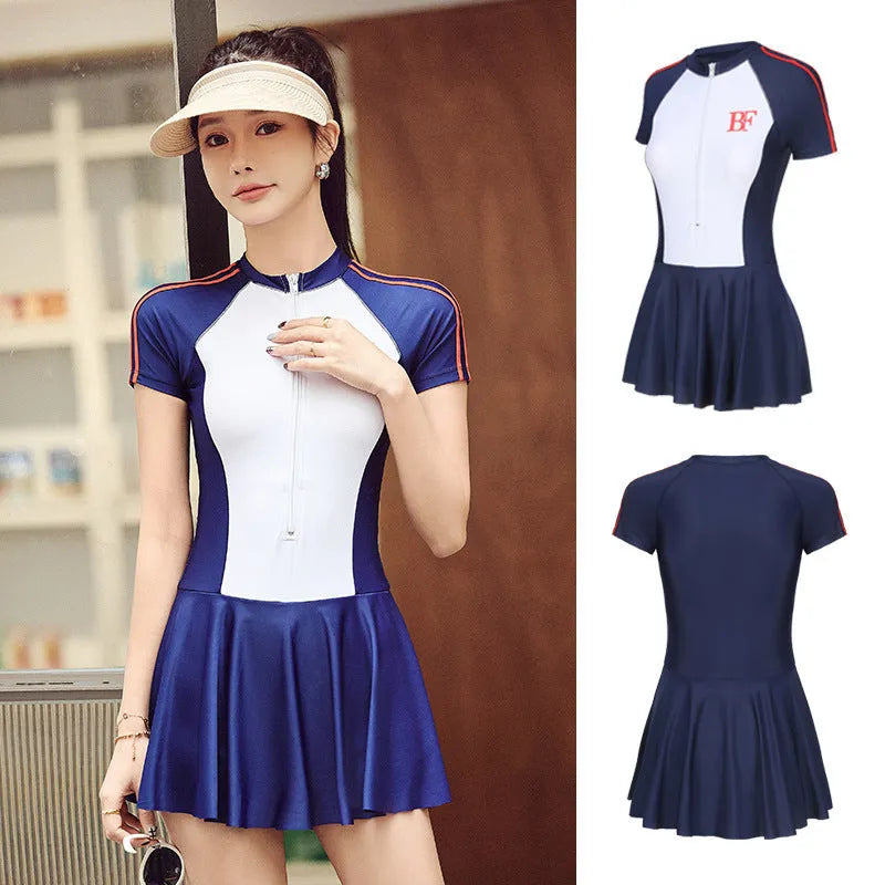 Ladies conservative style one-piece swimsuit in elastic polyester for sports.