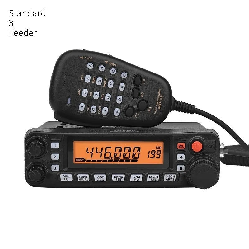 Handheld car radio interphone walkie-talkie with antenna for self-driving tours on a car dashboard.
