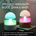 White rain cloud humidifier with falling raindrop effects and LED lighting