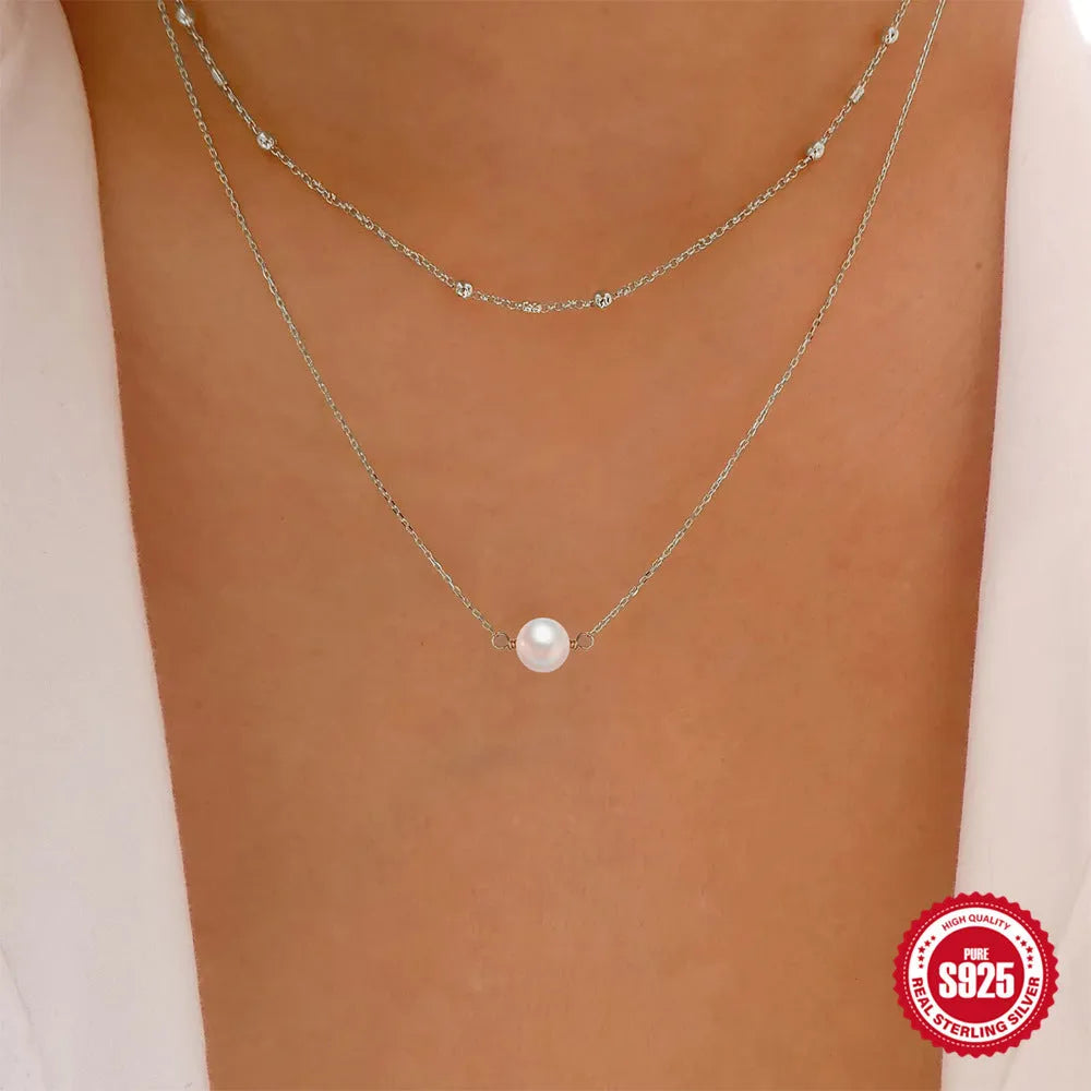 Sterling silver double layer women's necklace with twin pearls and ball bead chain