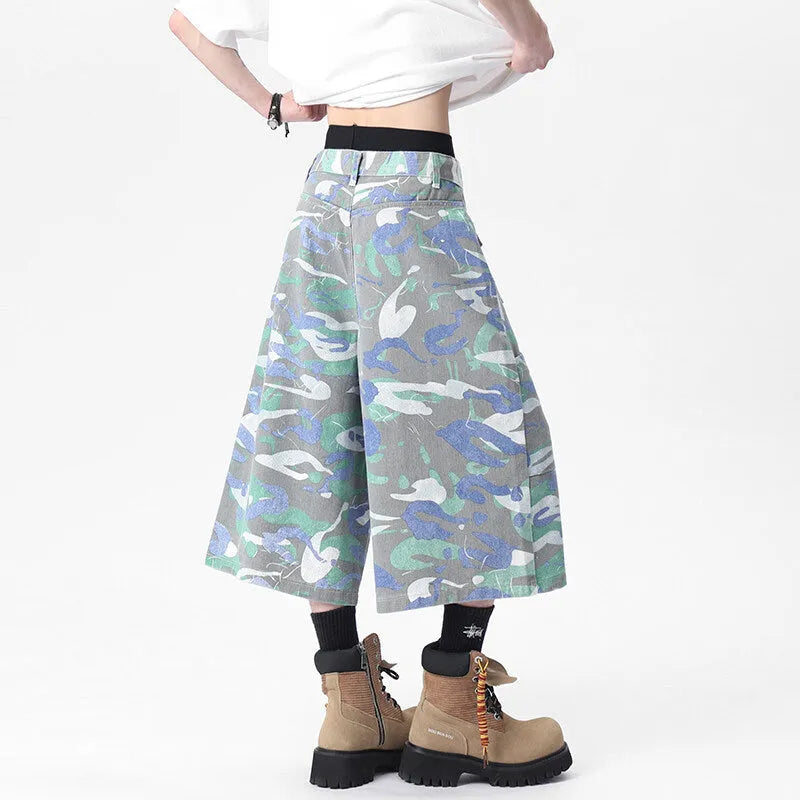 Denim camouflage cropped trousers with straight leg and utility pockets on mannequin