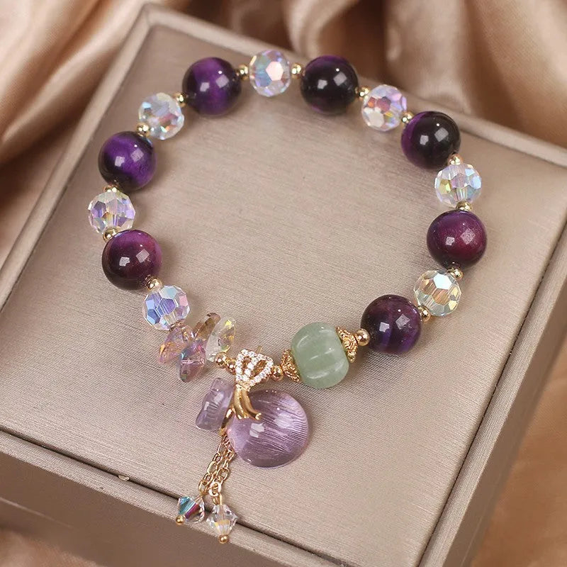 Purple Tigereye money bag pendant transport bracelet with crystal and rhinestone details