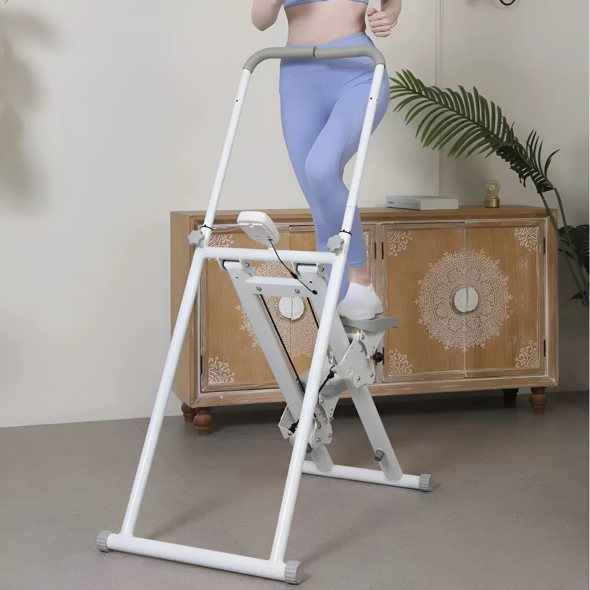 Starlight White foldable treadmill integrated with a climbing frame for home gym use.