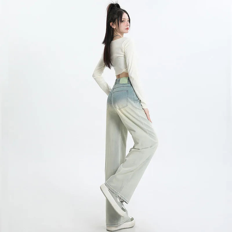Women's gradient blue wide-leg straight-leg denim trousers on a hanger.