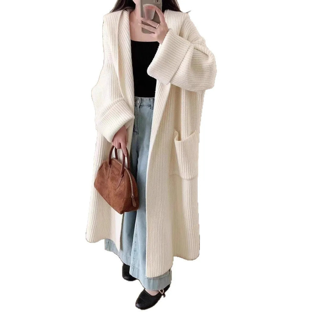 Women's loose grey hooded acrylic cardigan coat with long sleeves, shown open.