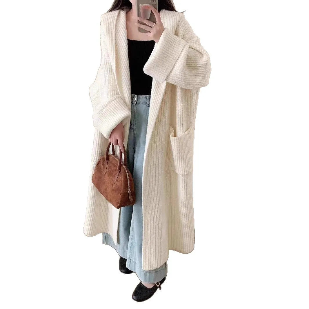 Women's loose grey hooded acrylic cardigan coat with long sleeves, shown open.