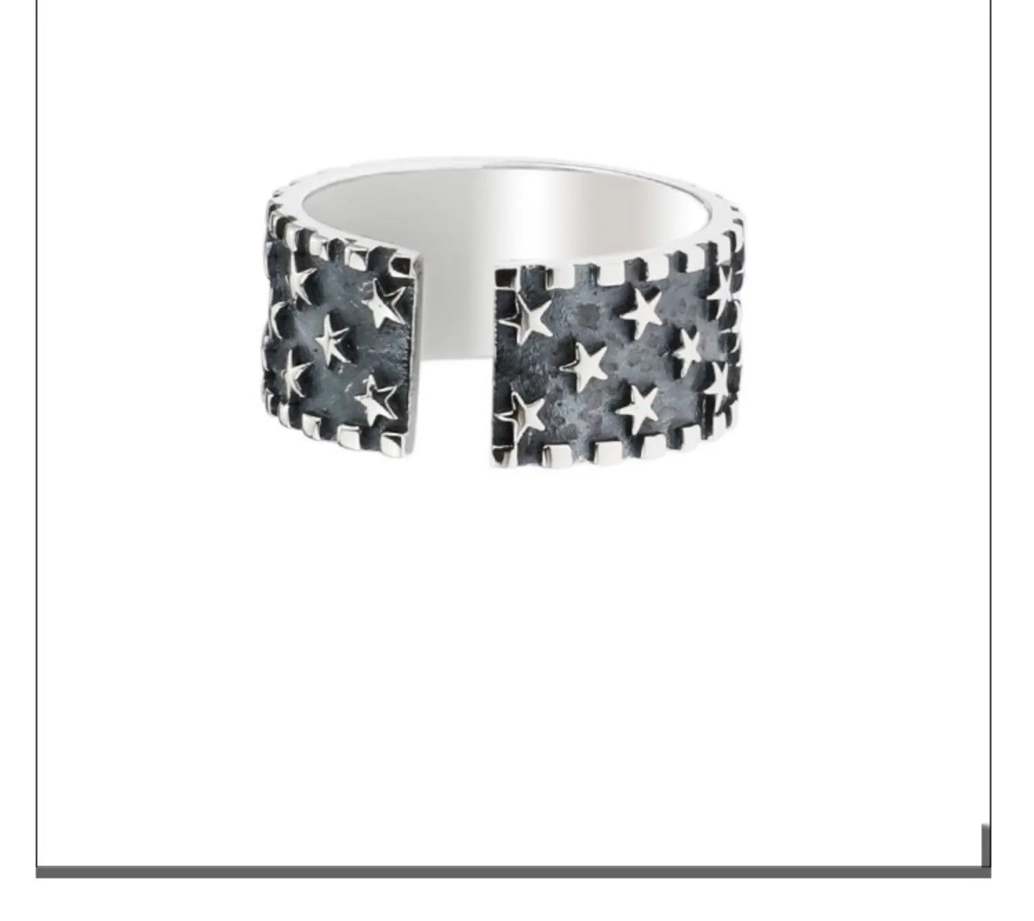 Sterling silver ring with geometric multi star pattern and adjustable opening.