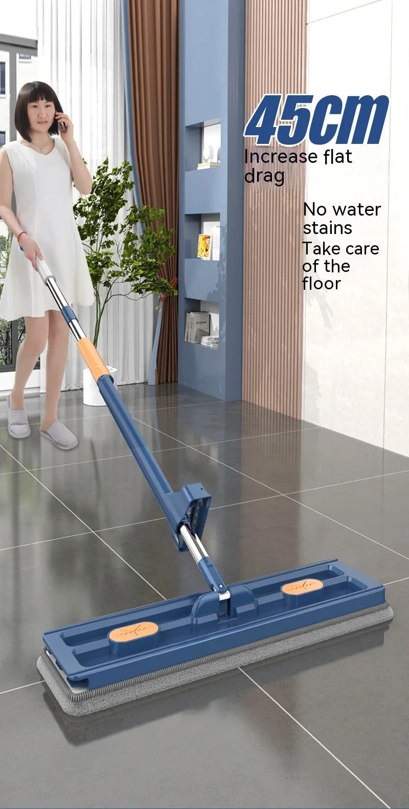 Large flat mop with blue cloth on stainless steel telescopic handle showing rotating head mechanism