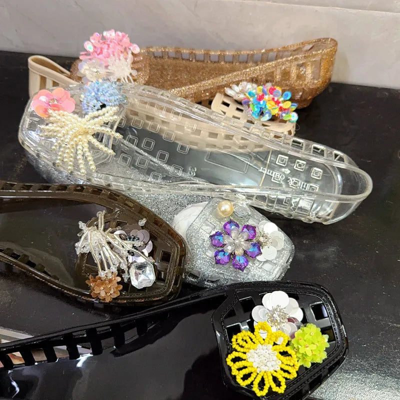 Women's transparent square toe PVC gel slipper on a neutral background, showing the distinctive toe shape.
