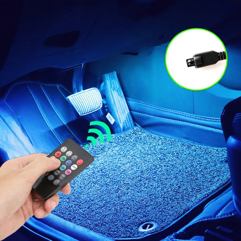 Car interior footwell LED accent lighting kit with four light strips and voice control unit