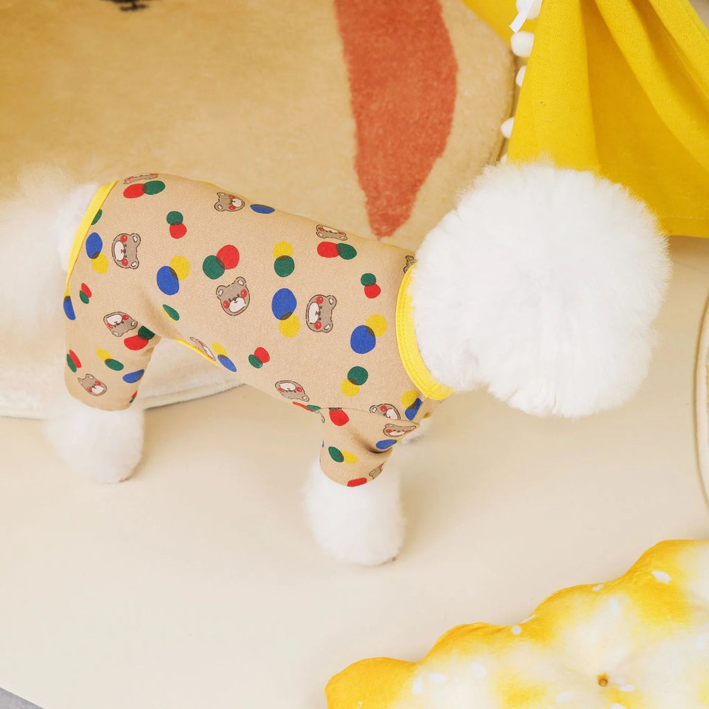 Beige dog jumper with colourful ball bear print, shown on a dog, made from cotton and spandex blend.