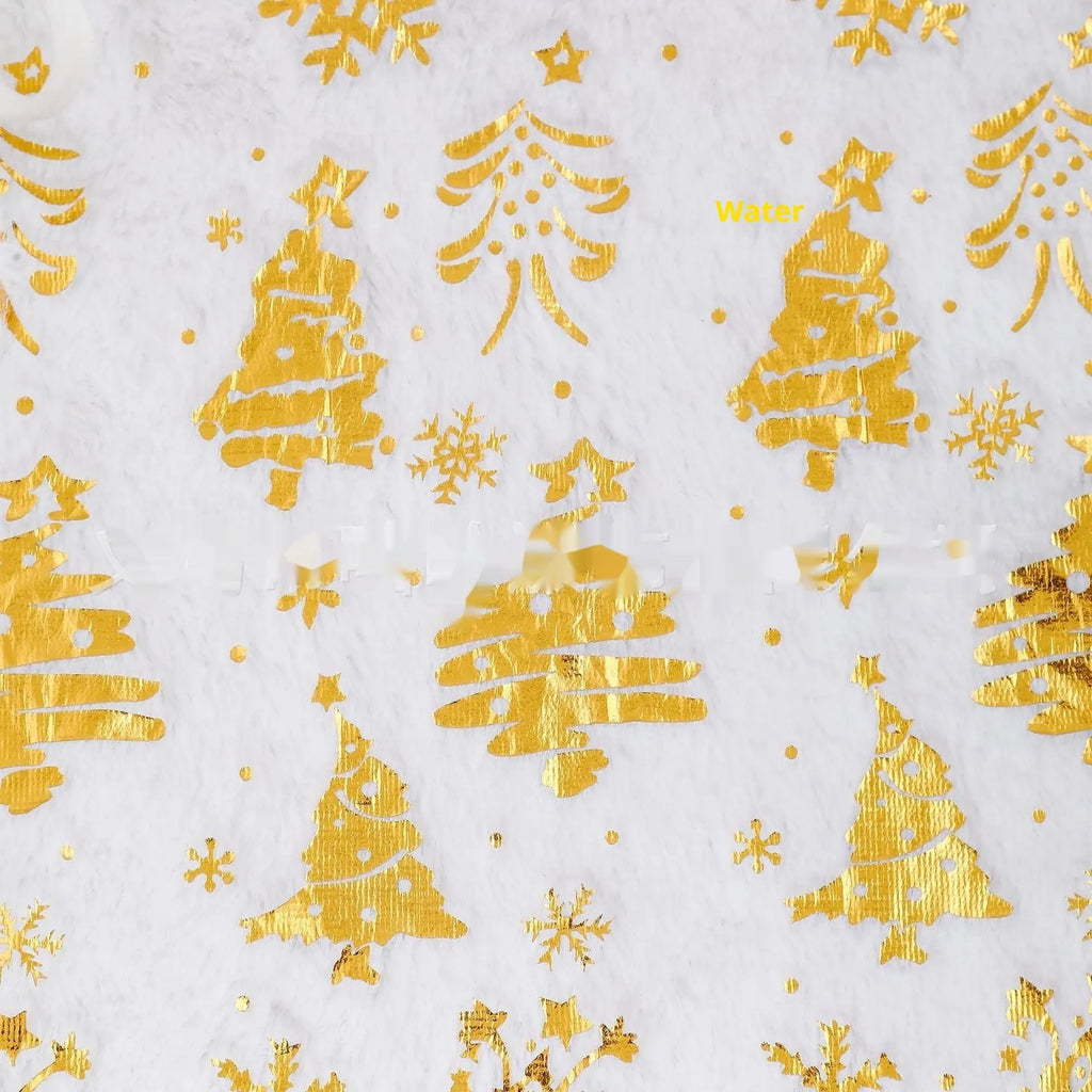 Plush Christmas tree floor mat with gilding snowflake design in one of four sizes.