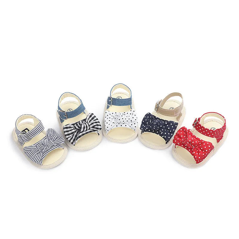 Black and white Velcro fastening toddler shoes for infants with low-cut design