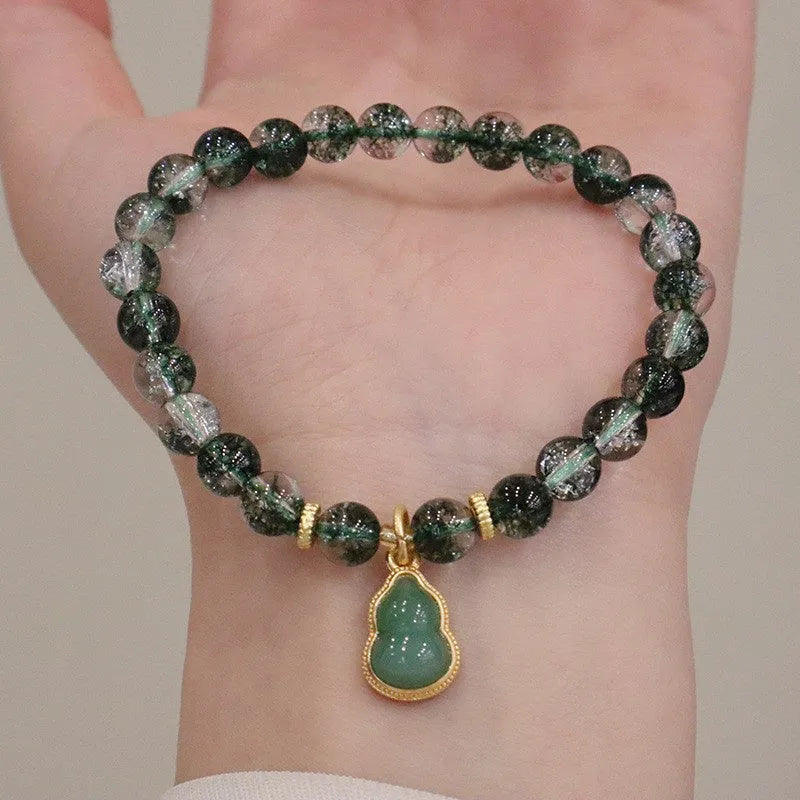 Women's natural crystal bracelet with green phantom quartz heart pendant and pearl accents