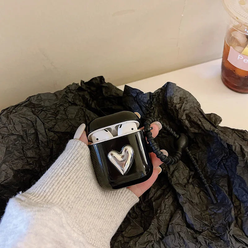 Black TPU earphone sleeve with electroplated love heart design and black cord for AirPods case