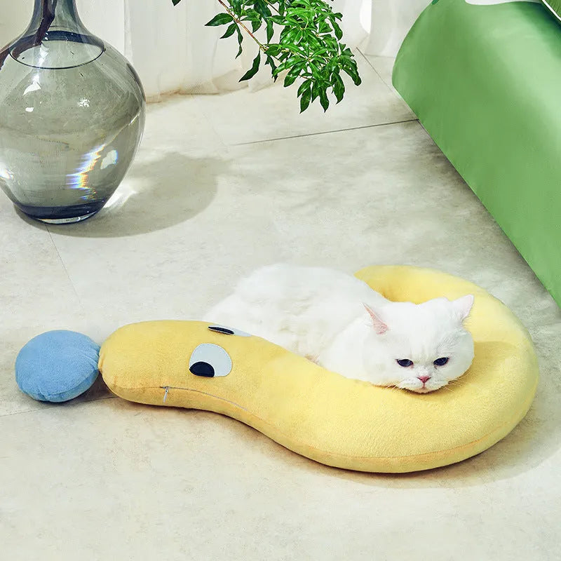 Blue and yellow rectangular pet pillow measuring 62 by 39 centimetres for dogs and cats.